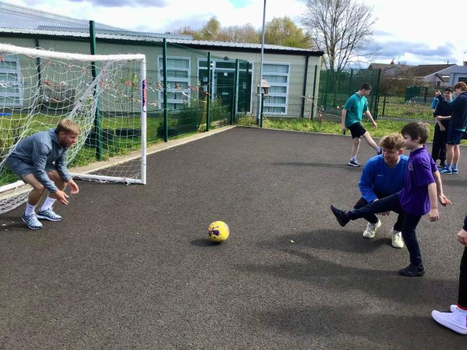 Coleraine players and head coach in visit to Sandelford