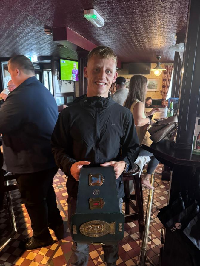 Matty Boreland leads post fight celebrations in the Railway Arms